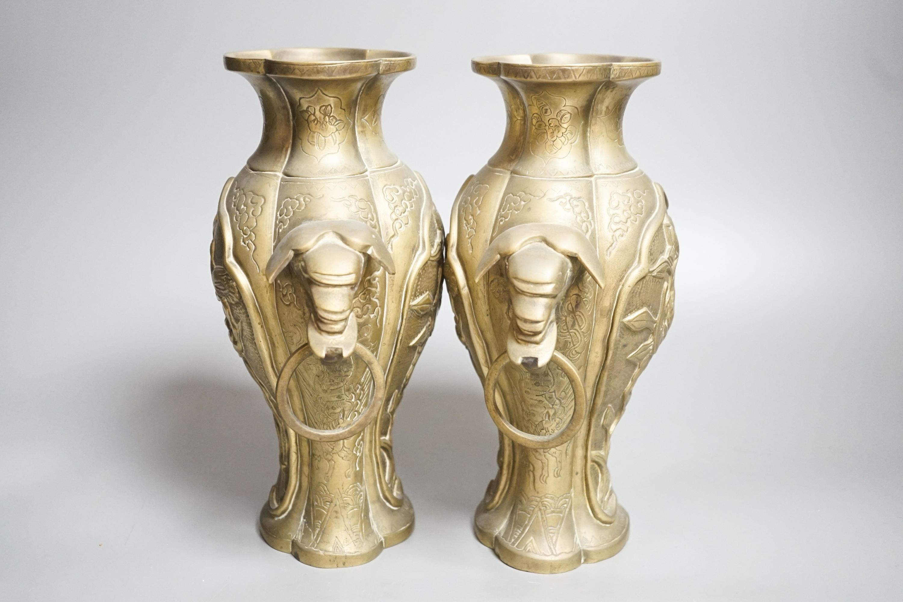 A pair of Chinese bronze vases 24cm